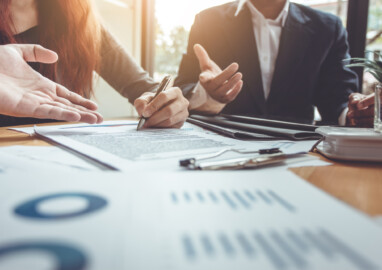 Business Signing a Contract Buy - sell house.